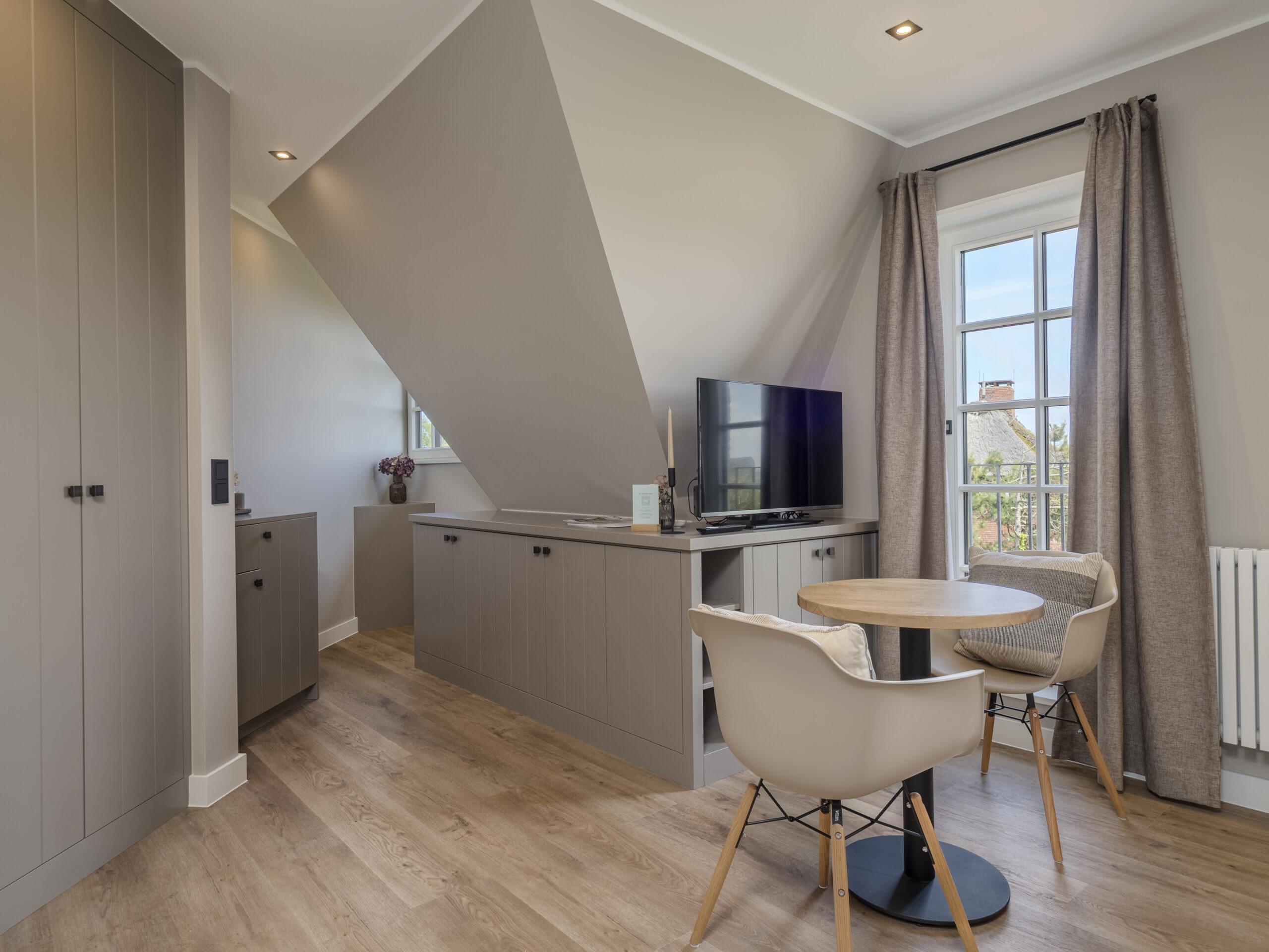 Wohnzimmer mit Essbereich - Hotel Duene Residence 23