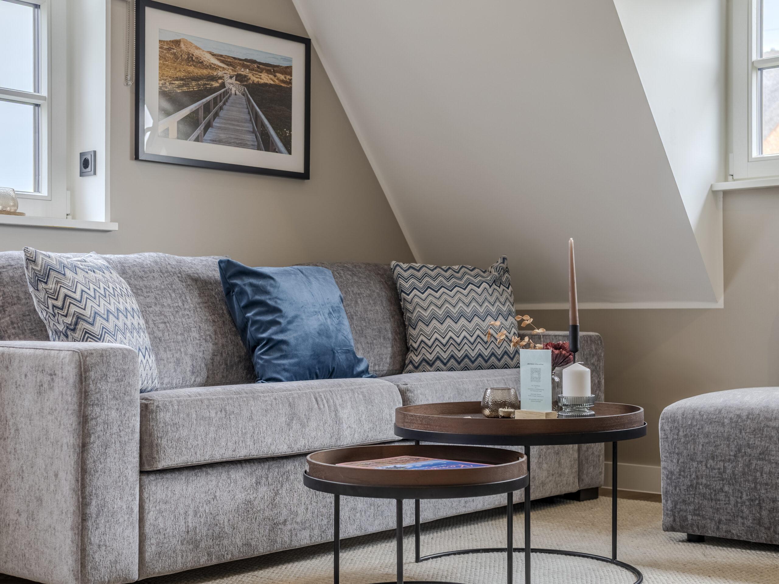 wohnzimmer mit Sofa - Hotel Duene Residence 27
