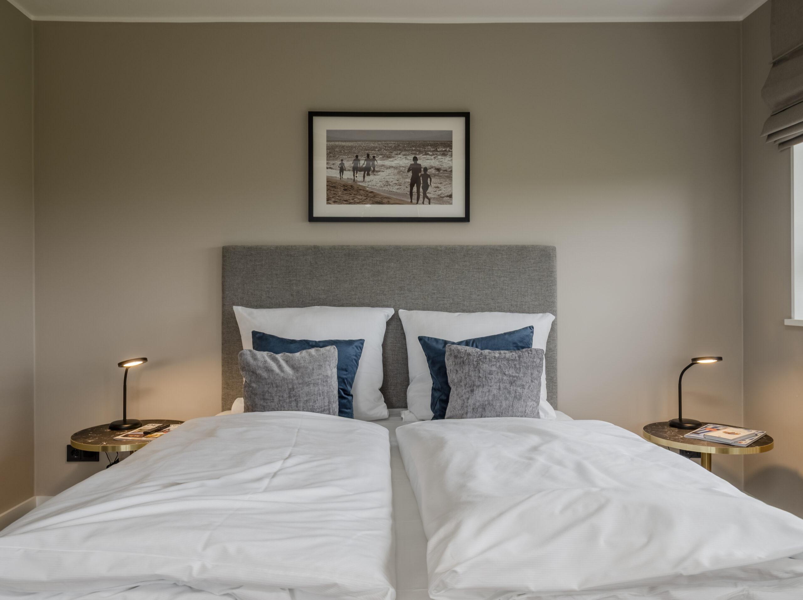 Doppelbett im Schlafzimmer - Hotel Duene Residence 27