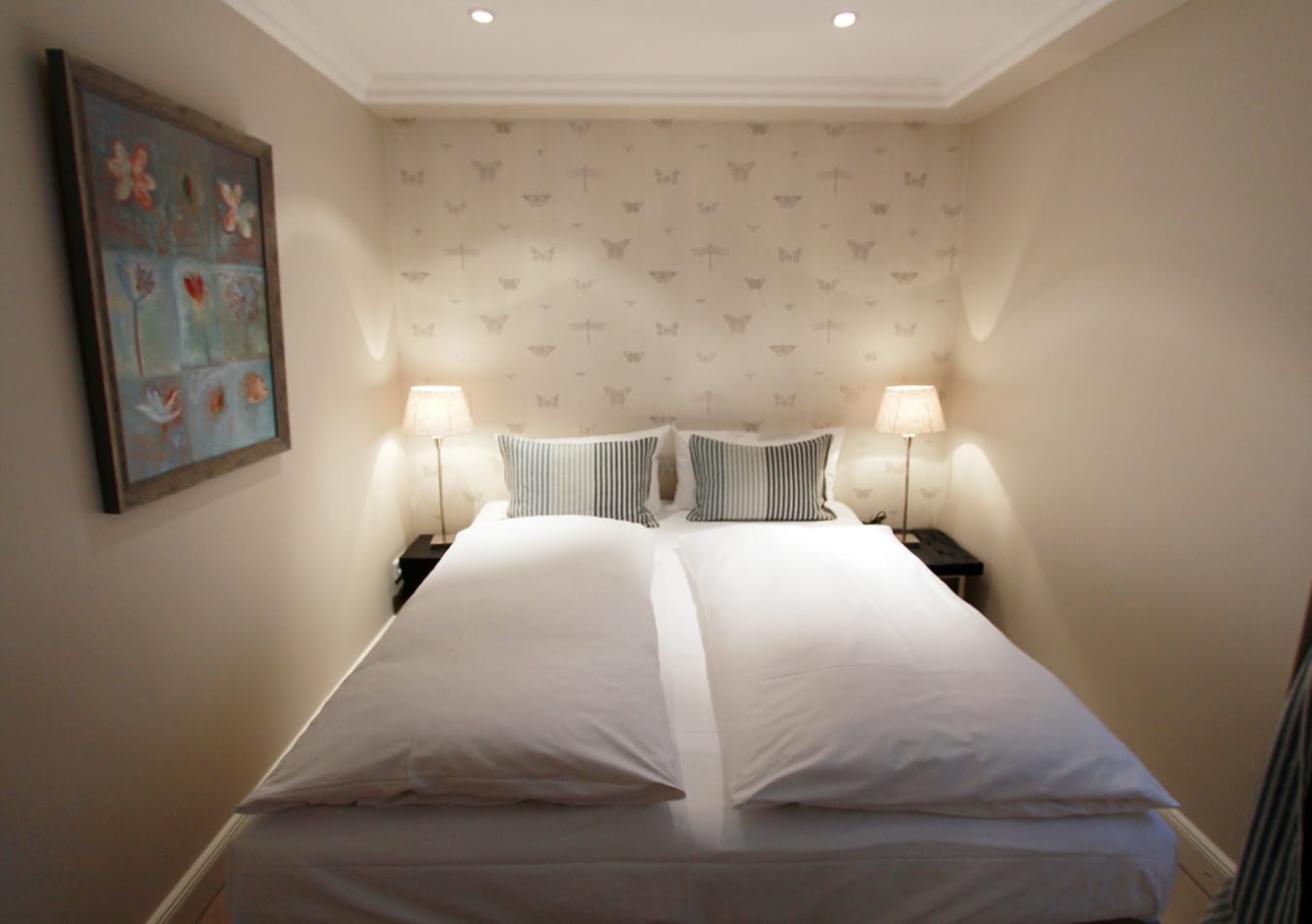 Foto Schlafzimmer mit Doppelbett Ferienwohnung Reethüs am Wattenmeer des Hotel Duene