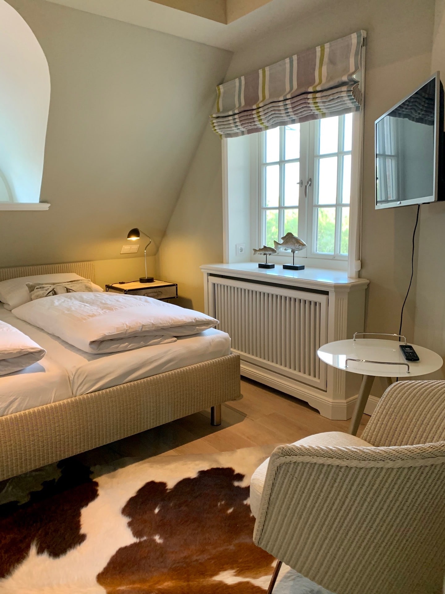 Schlafzimmer für Paare in der Ferienwohnung "Sonnenhügel" in Rantum auf Sylt, betreut vom Hotel Düne